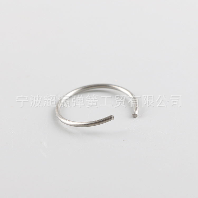 Special-shaped piston tension spring