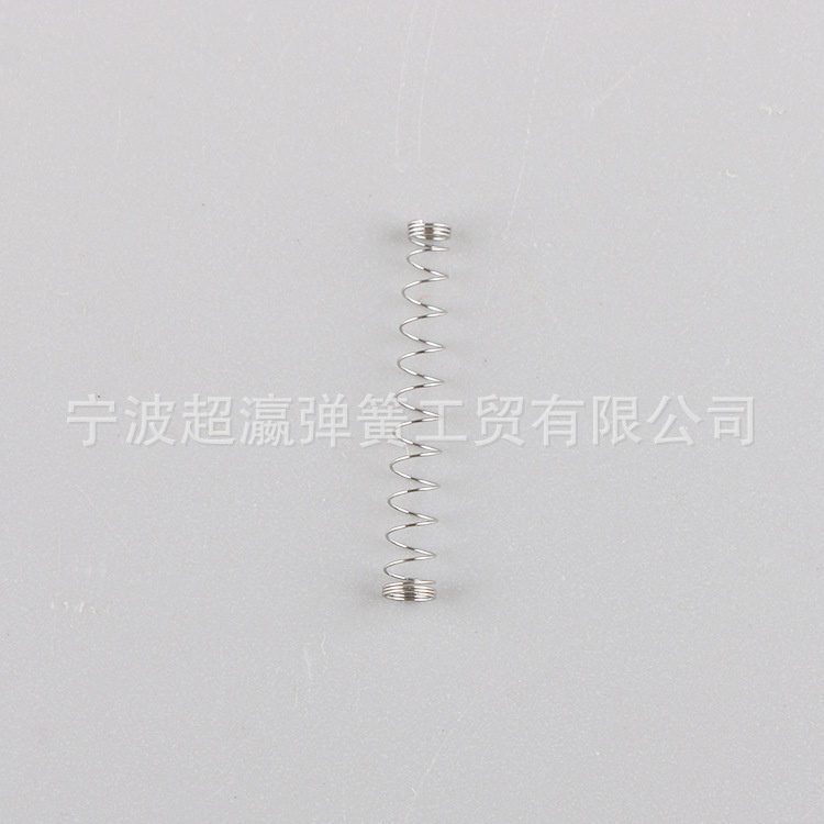 Needle seat spring