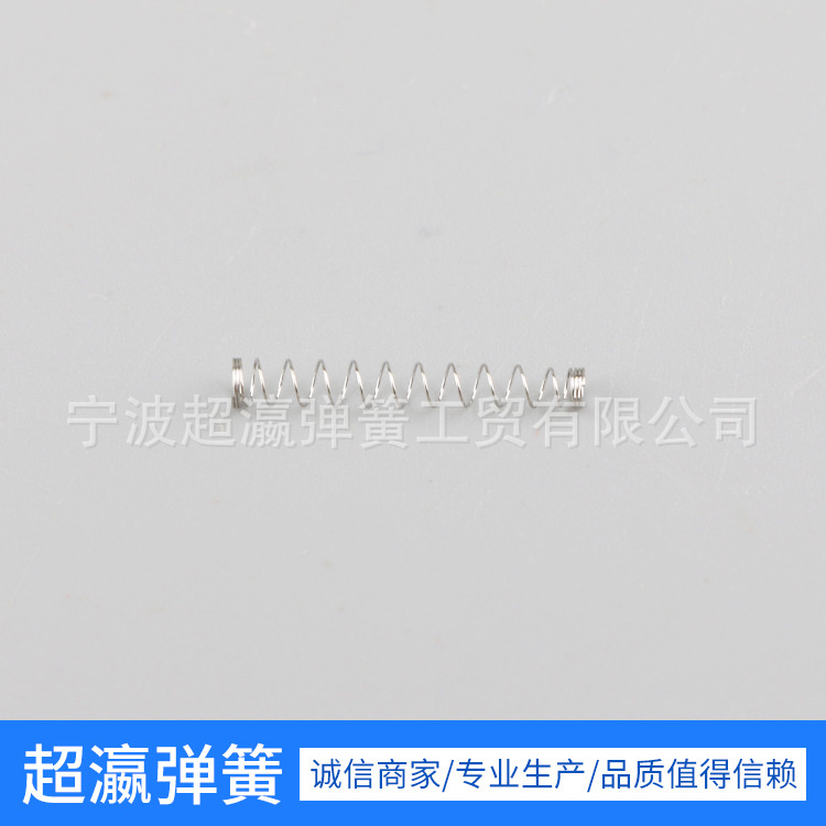 Needle seat spring