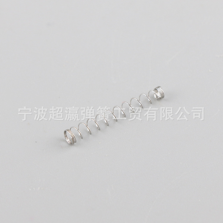 Needle seat spring