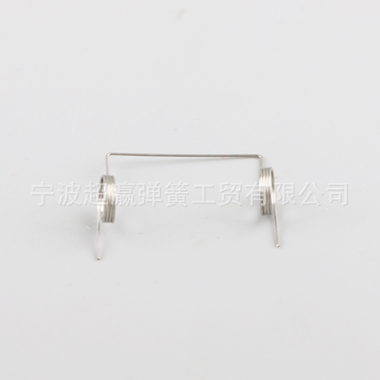 Integrated box buckle shaped spring